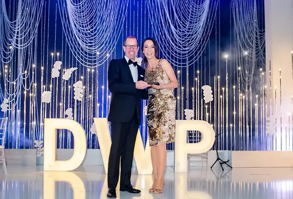 Lidia Wandas - Wilczura receiving the Globetrotter - DWP ACE Planner Award 2019 (Region: Europe) in Dubai in 2019.