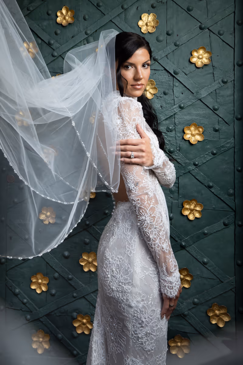 Wedding at the Wieliczka Salt Mine. The bride in a wedding dress poses for a photo