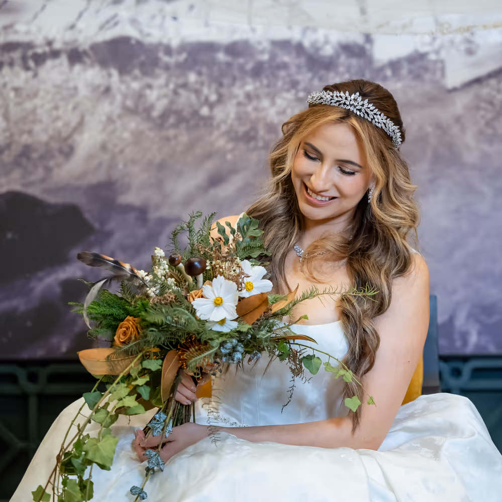 Wedding at the Wieliczka Salt Mine. Poland. A shot of the bride in a wedding dress and veil. The bride poses for a photo.
