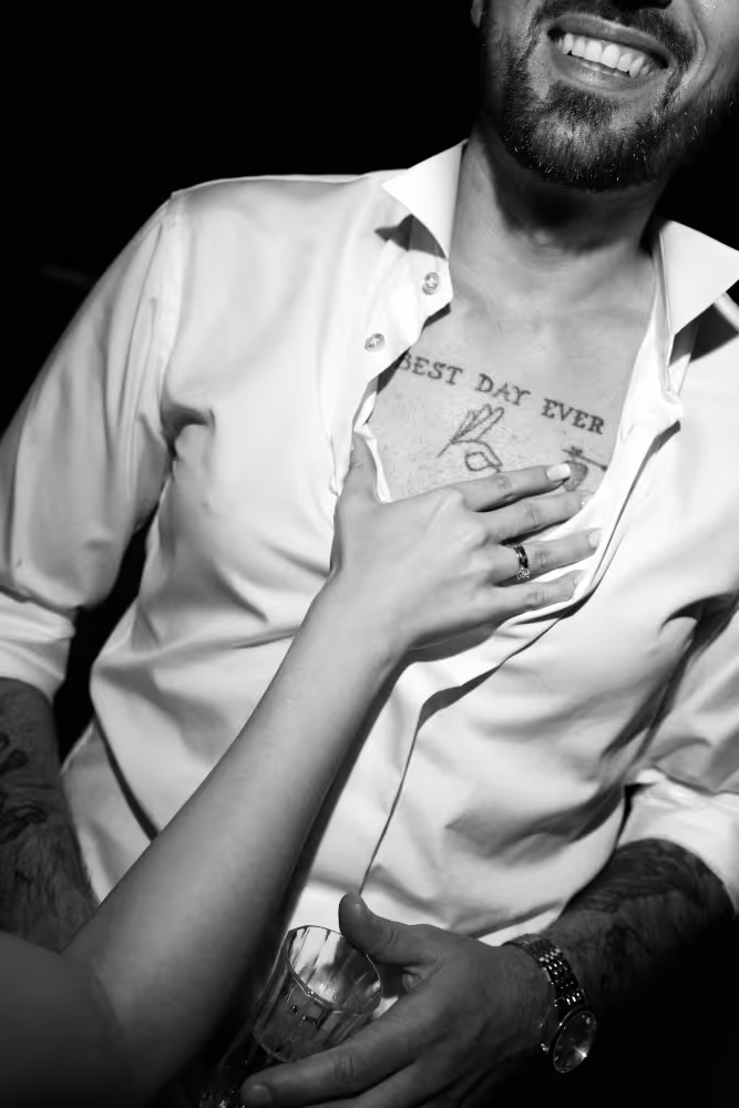 Wedding in Greece. Santorini. A shot of the groom in a shirt