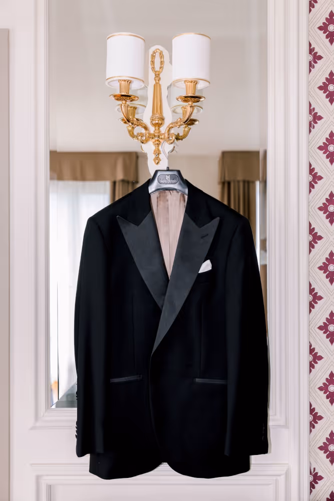Wedding in Italy. Lake Como. A photo of a wedding suit hanging on a hanger