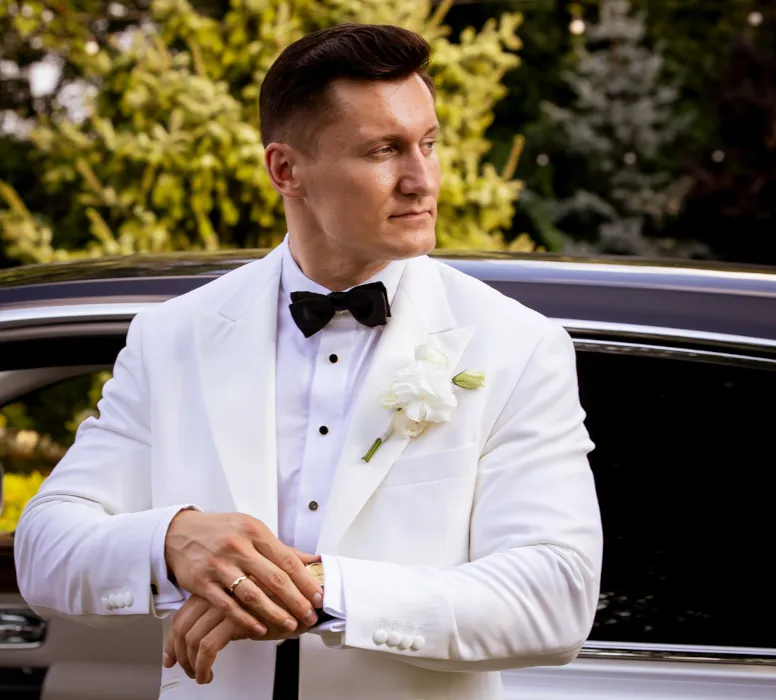 A wedding in Piekary Śląskie, Poland. A shot of the groom in his wedding suit.